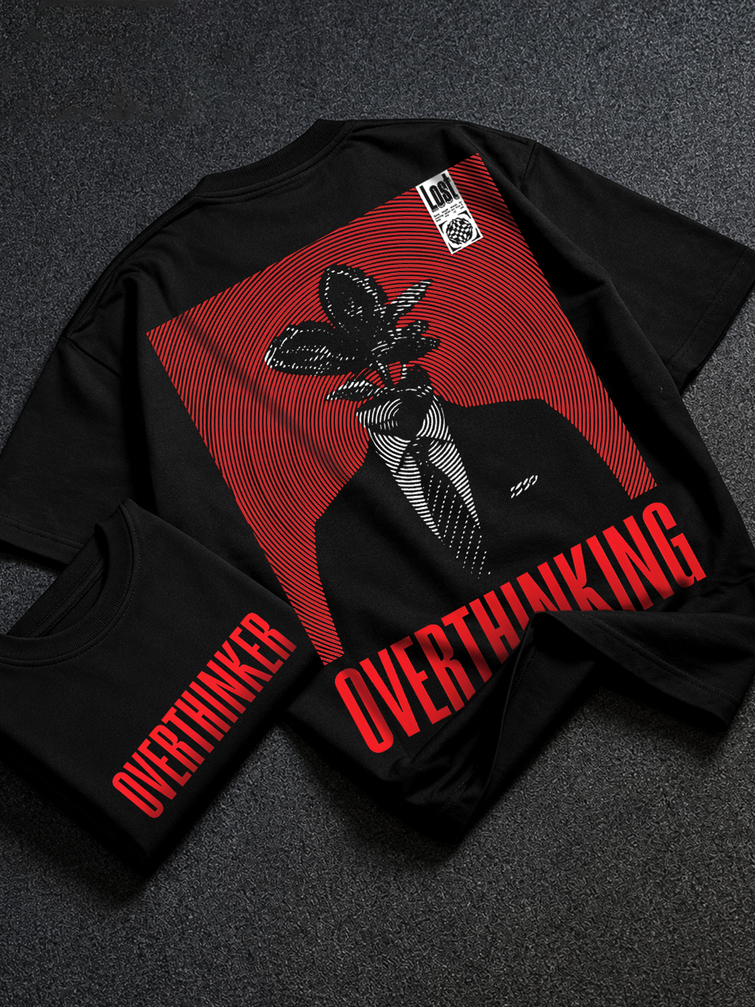 DVANS black oversized t-shirt with red and black optical graphic and bold Overthinking typography.